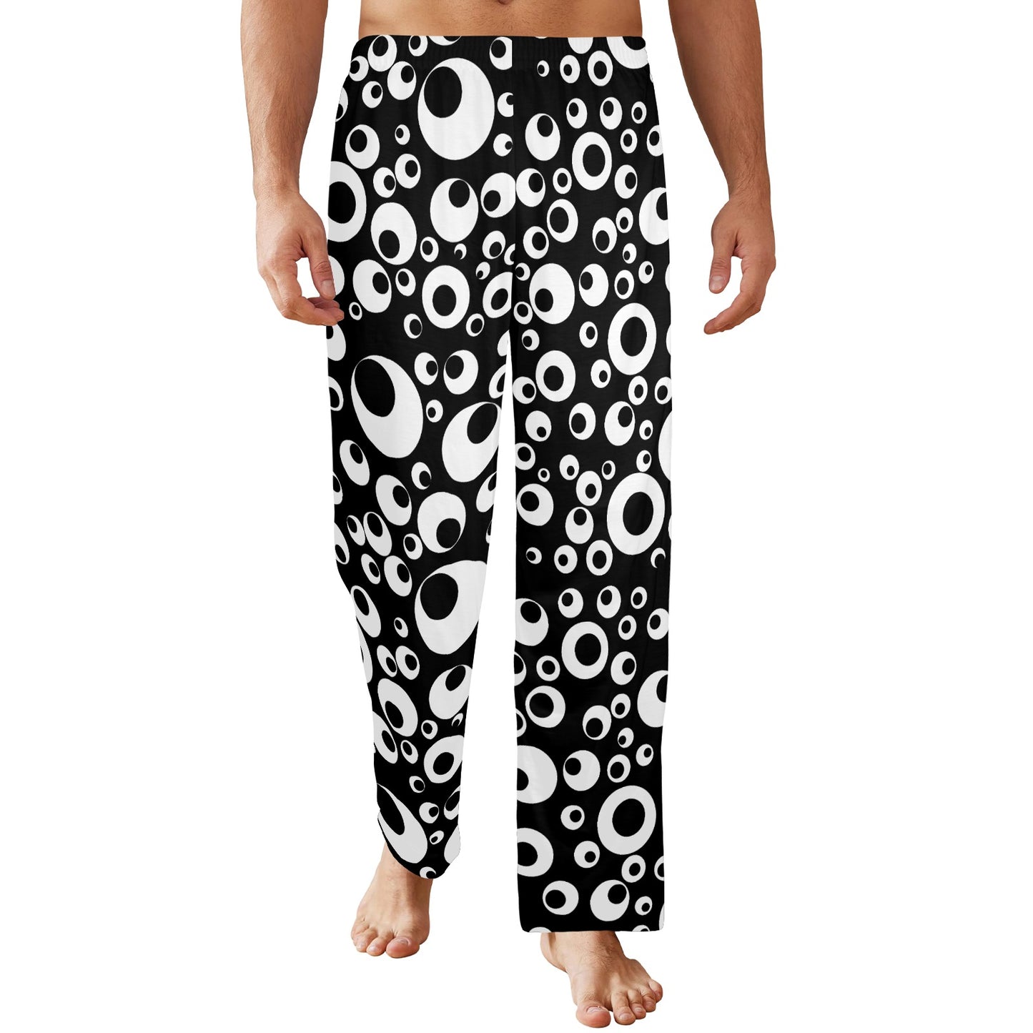 Googly Everything pants nonbinary trousers with black white googly eyes print