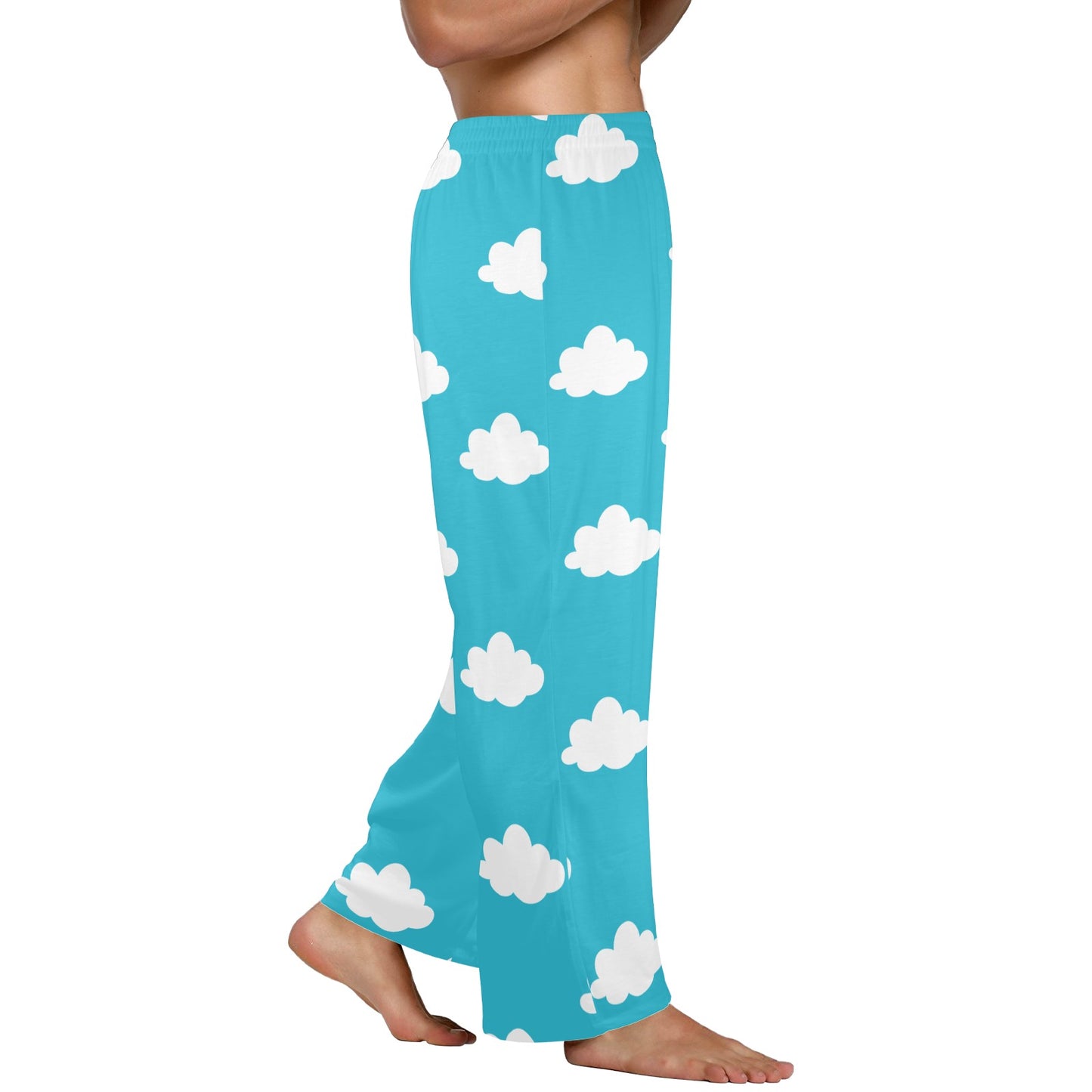 A person wearing light blue pajama pants featuring white cloud patterns, standing barefoot. The pants are loose-fitting and end at the ankles.