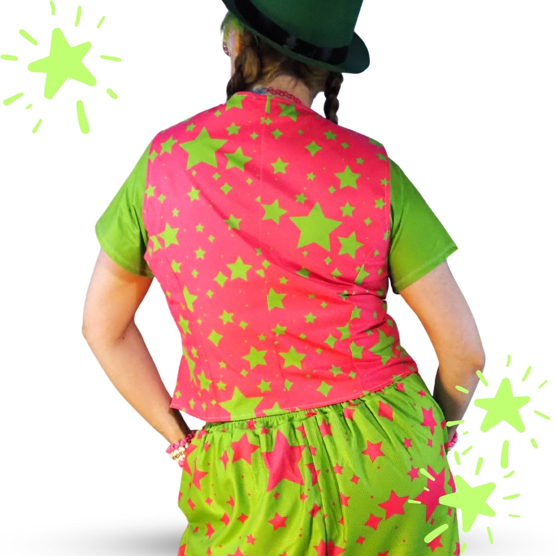 Person wearing a colorful outfit with pink and green star patterns on a white background