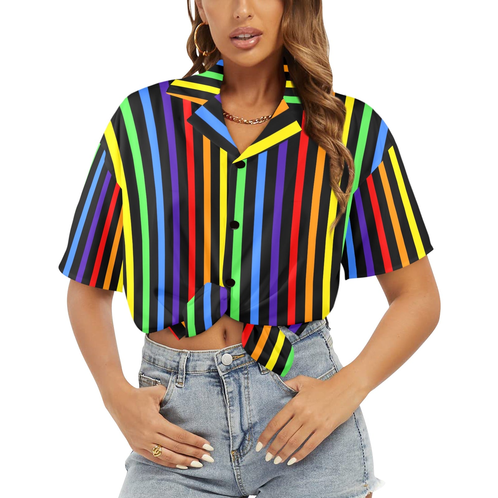 Woman wearing a colorful striped shirt and denim shorts on a white background