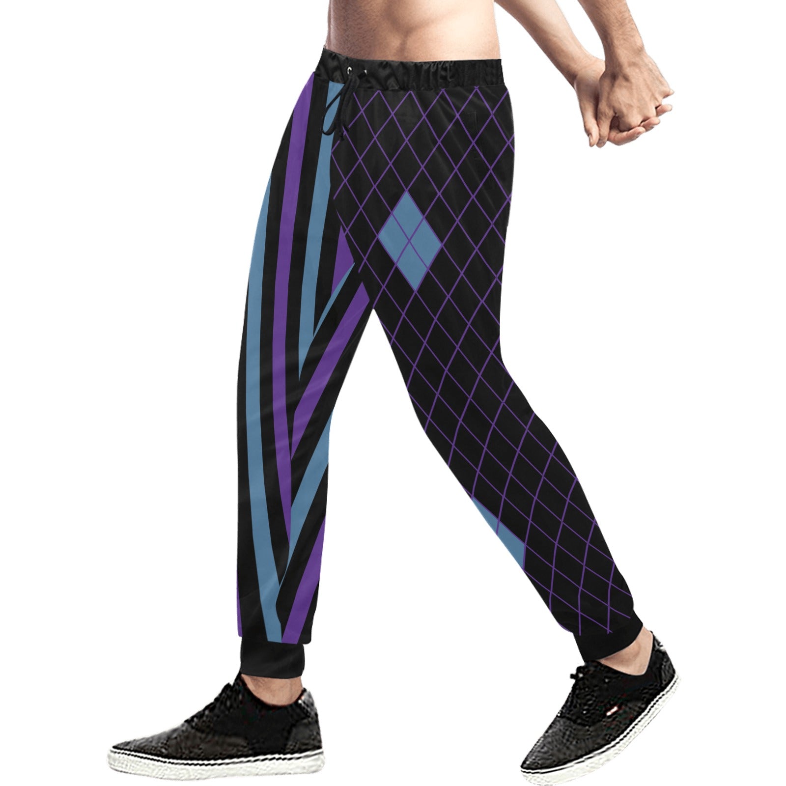 Person wearing black pants with blue and purple geometric pattern on a white background