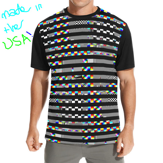 Person wearing a black t-shirt with colorful pixelated pattern on a white background