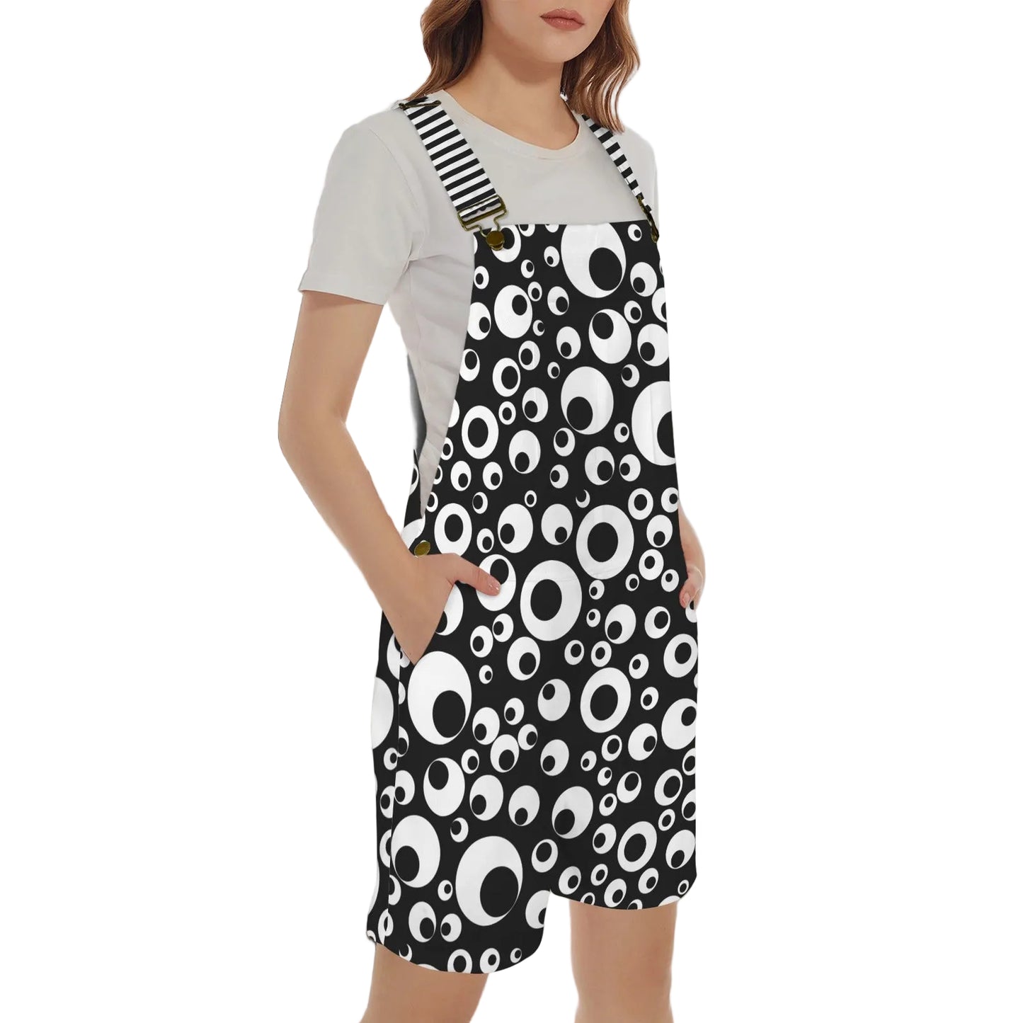 Googly Eye Shortie Overalls on a lady in a tan tshirt