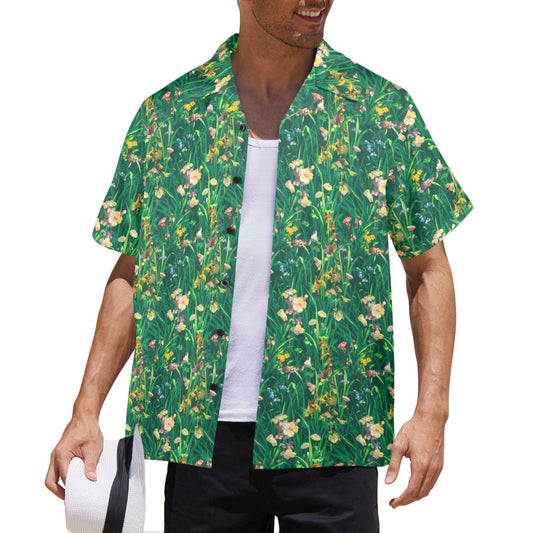 Man wearing a green floral patterned shirt on a white background