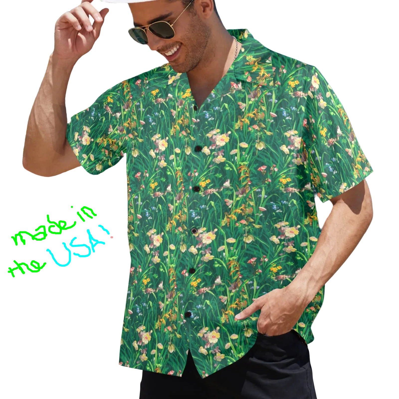Man wearing a green floral shirt on a beach