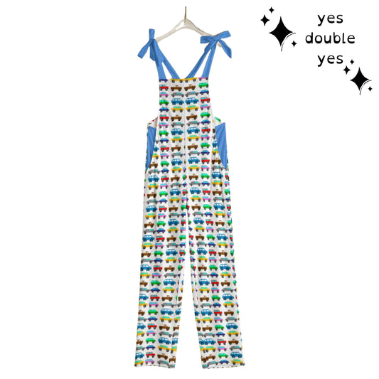 Womens bib overalls with cute little pixellated cartoon cars printed all over. Blue Straps and inner waist panel