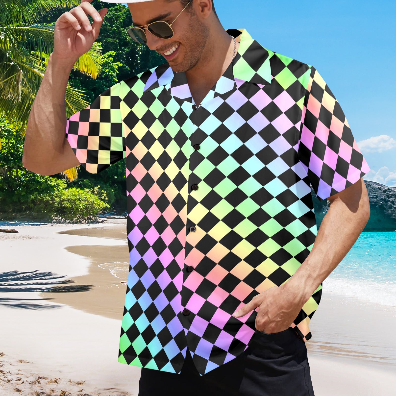 Man wearing a colorful checkered shirt on a beach
