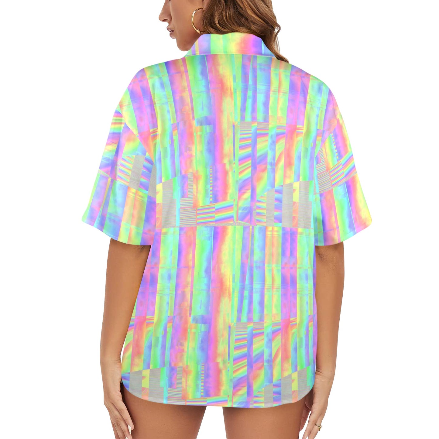 Woman wearing a colorful patterned shirt on a white background
