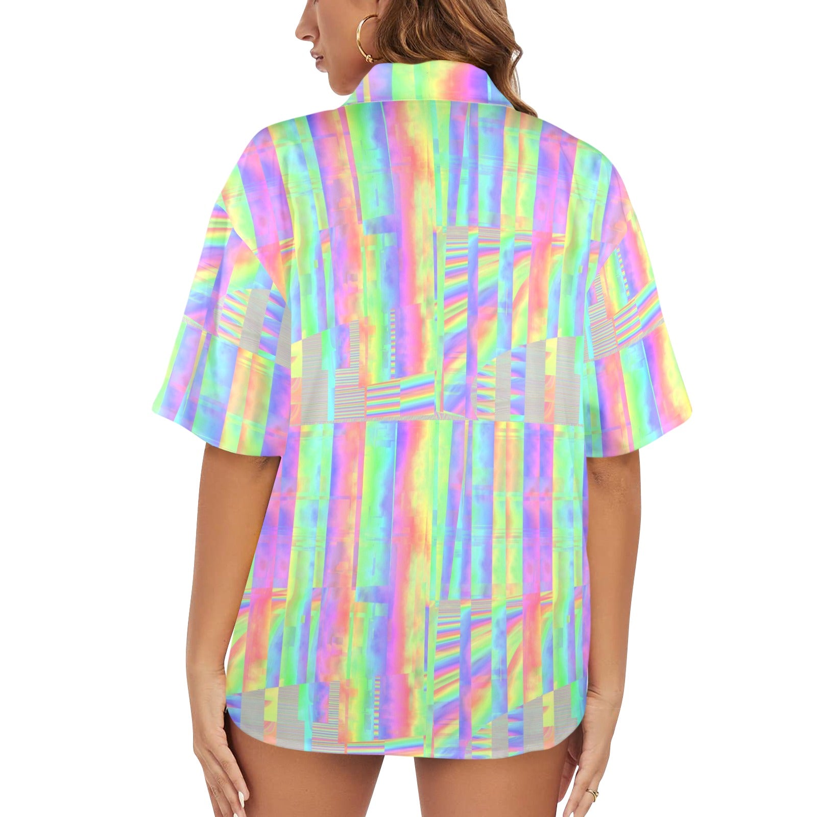 Woman wearing a colorful patterned shirt on a white background