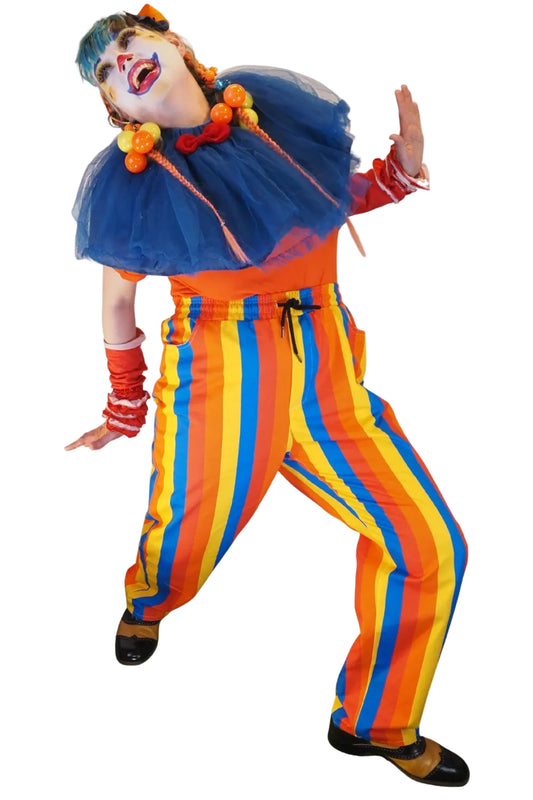 Clown in colorful outfit with striped pants on a white background
