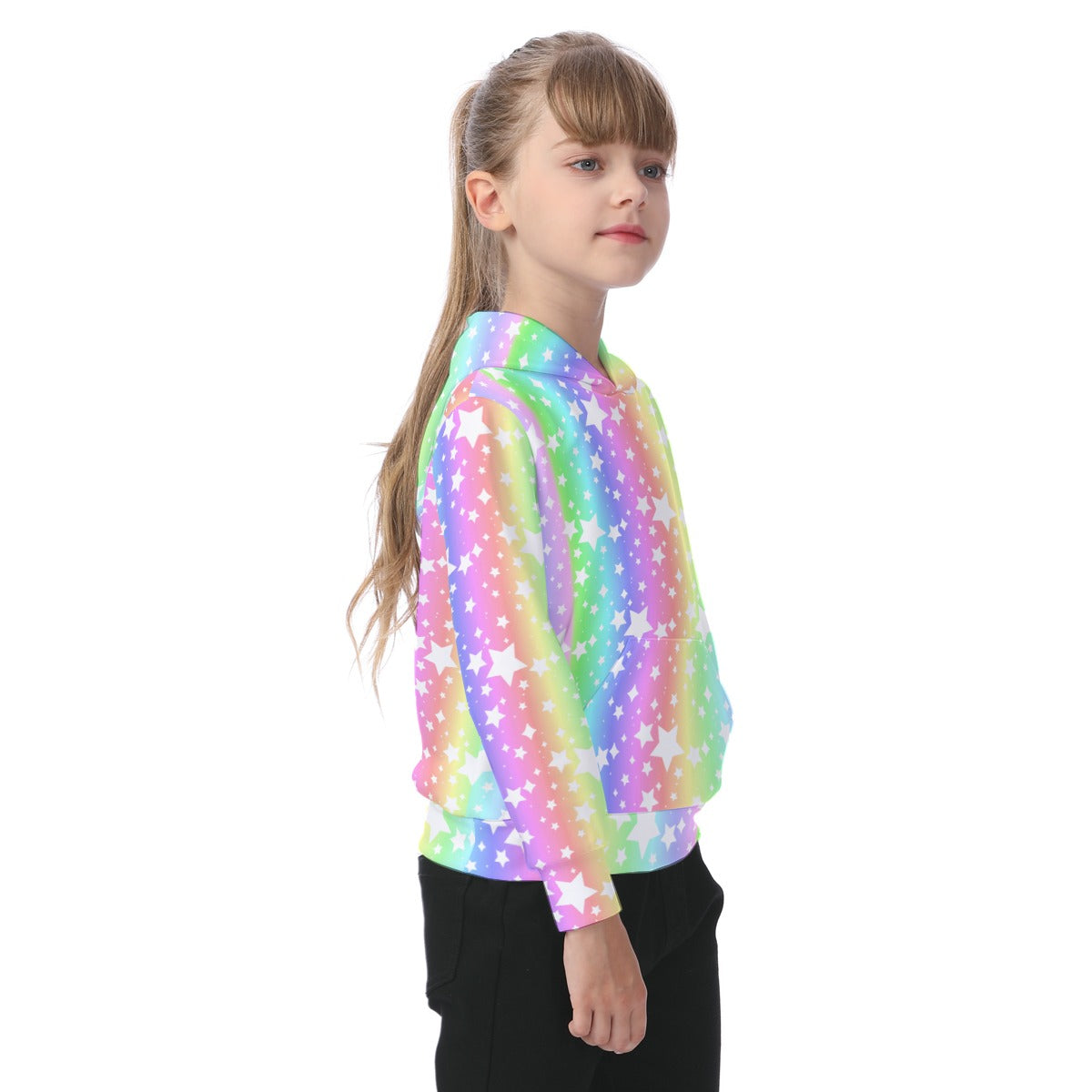 Young girl wearing a colorful star-patterned shirt on a white background