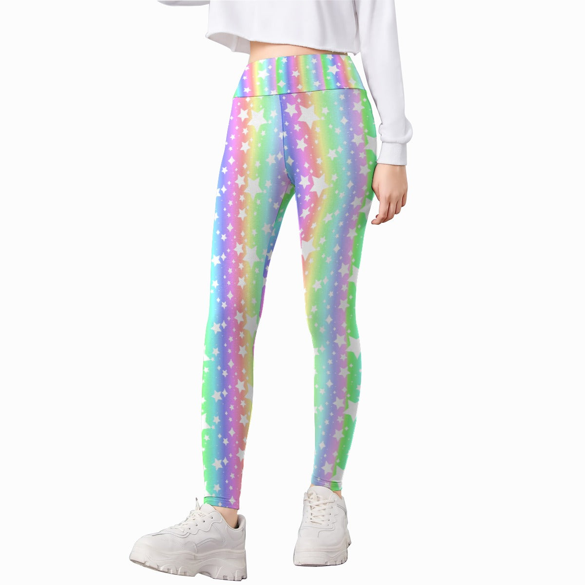 kid wearing colorful decora kei pastel rainbow star-patterned leggings on a white background