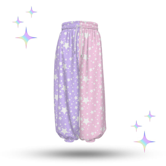 Pair of pastel pink and purple sweatpants with star pattern on a white background.
