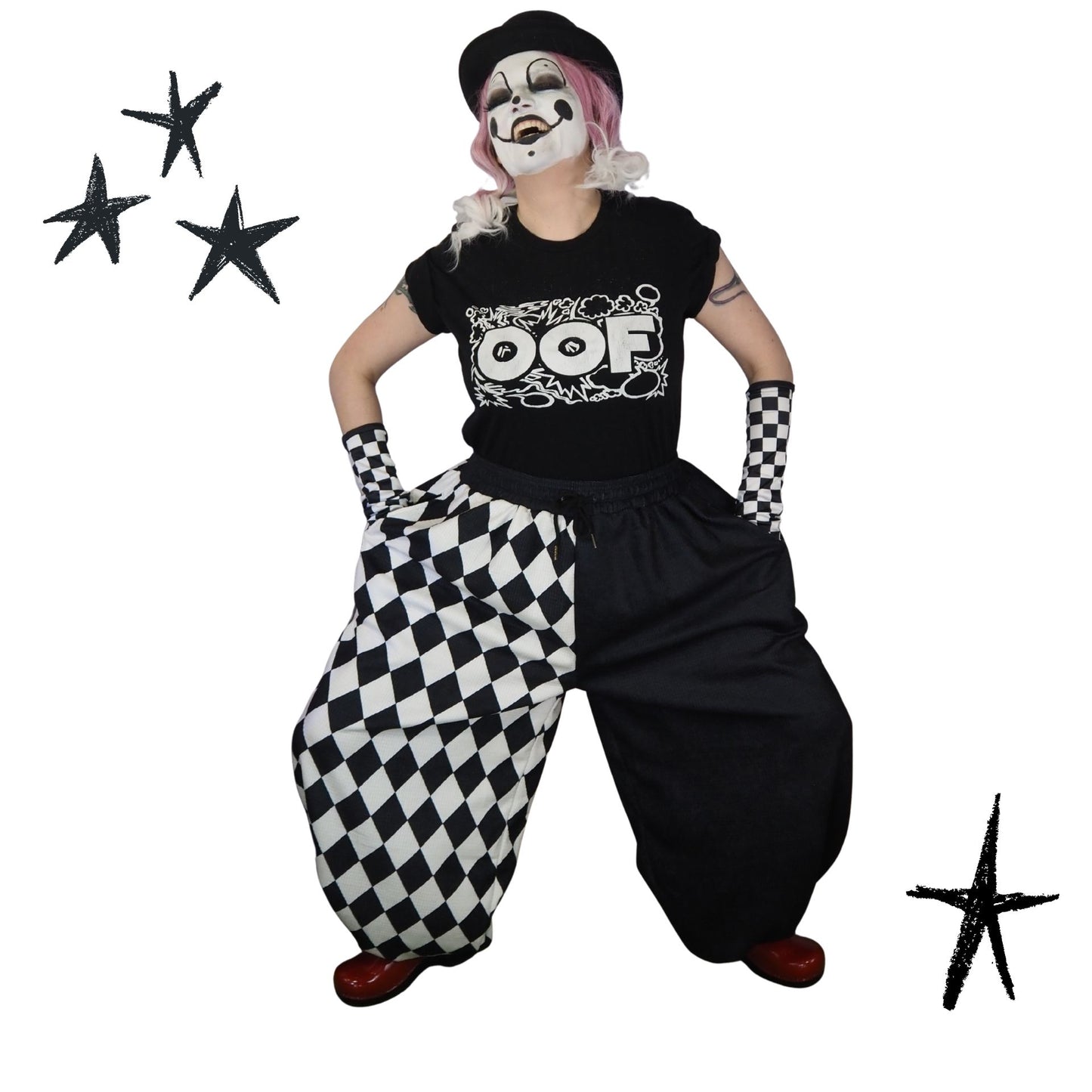 Person in a black and white checkered outfit with 'OOF' shirt, surrounded by stars on a white background
