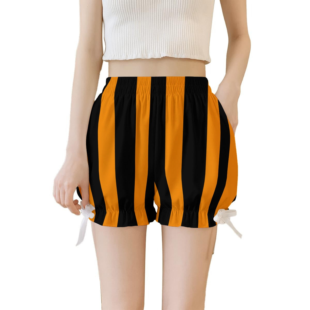 Black and orange striped shorts worn by a person on a white background
