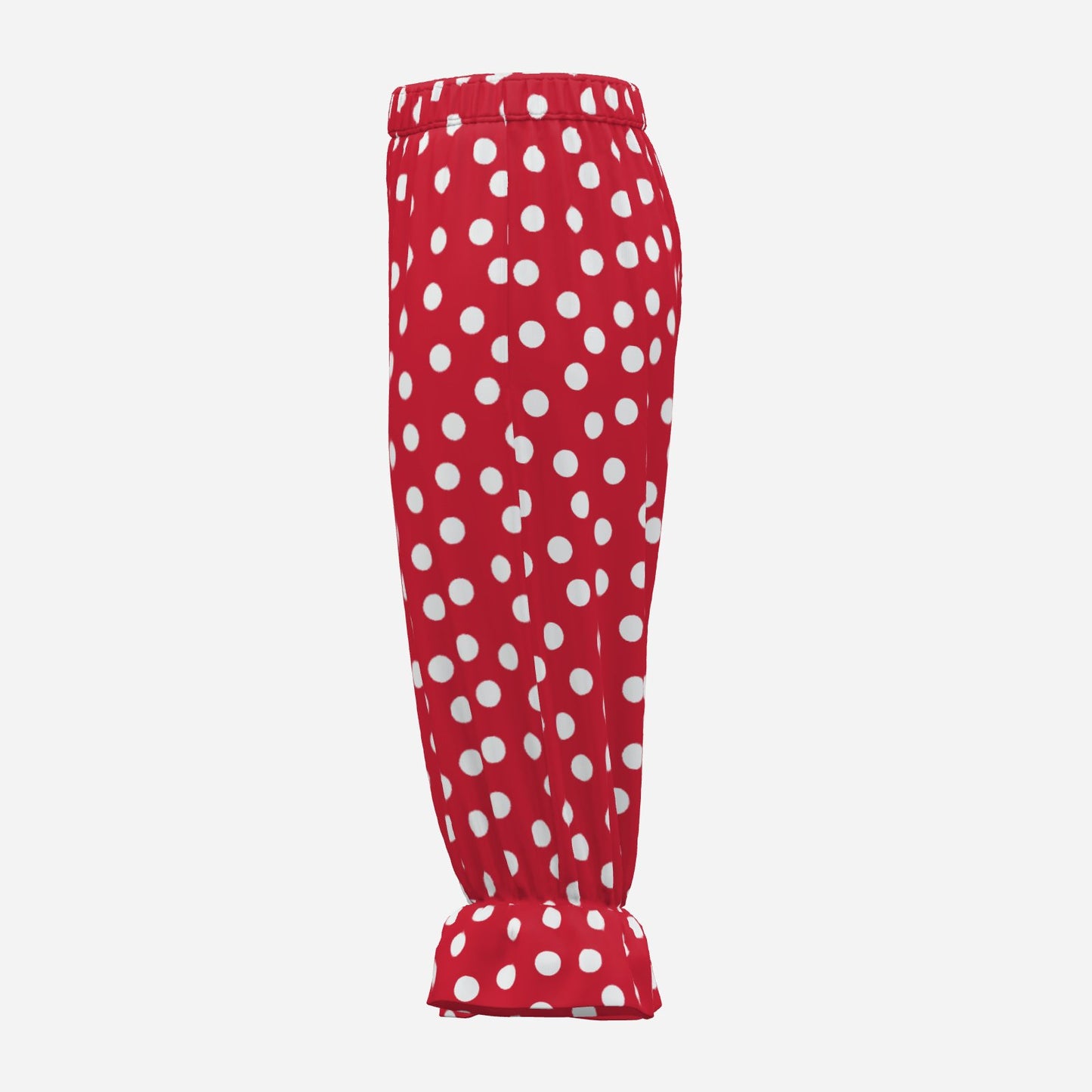 Red capri bloomers with white polka dots on a white background
