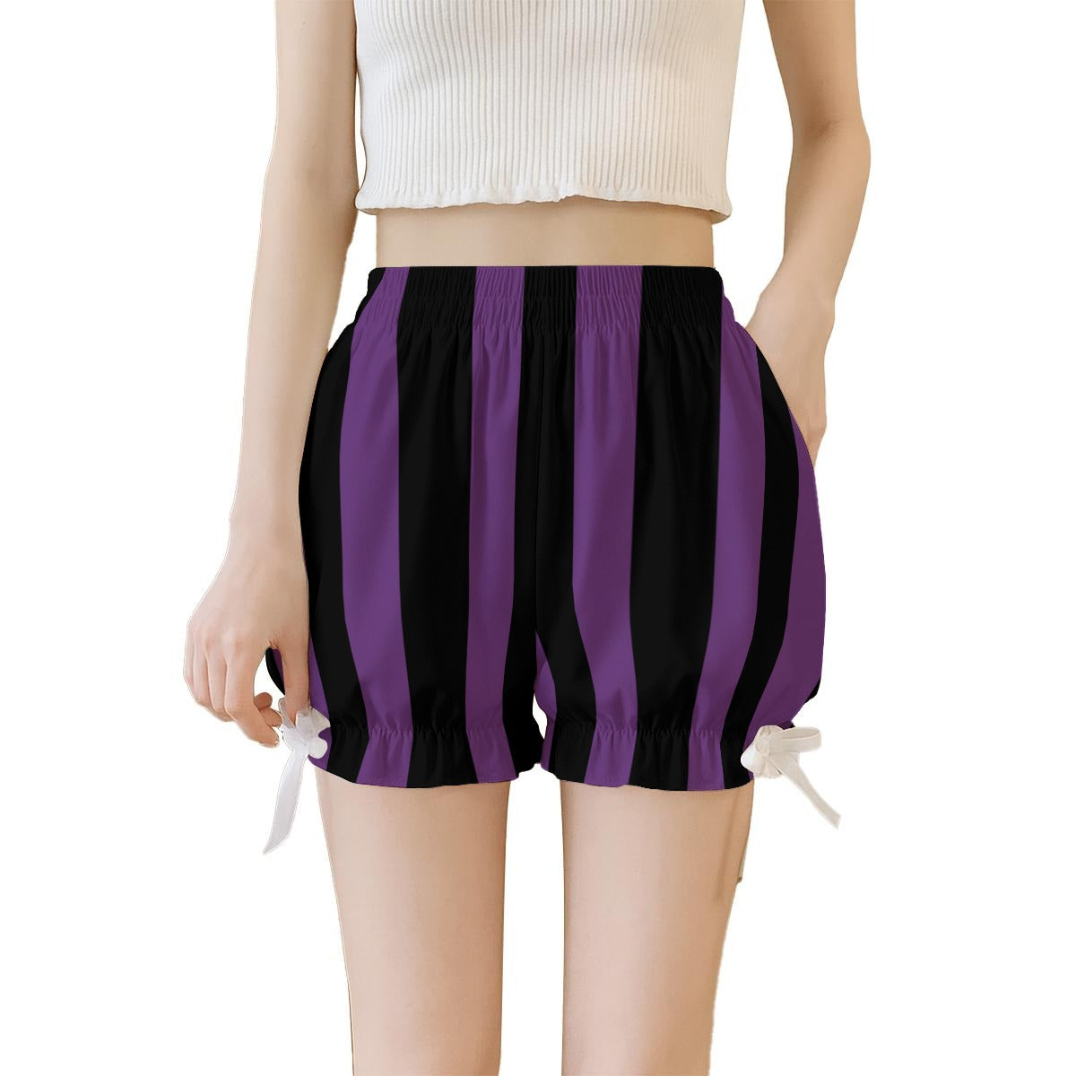 Purple and black striped shorts worn by a person on a white background