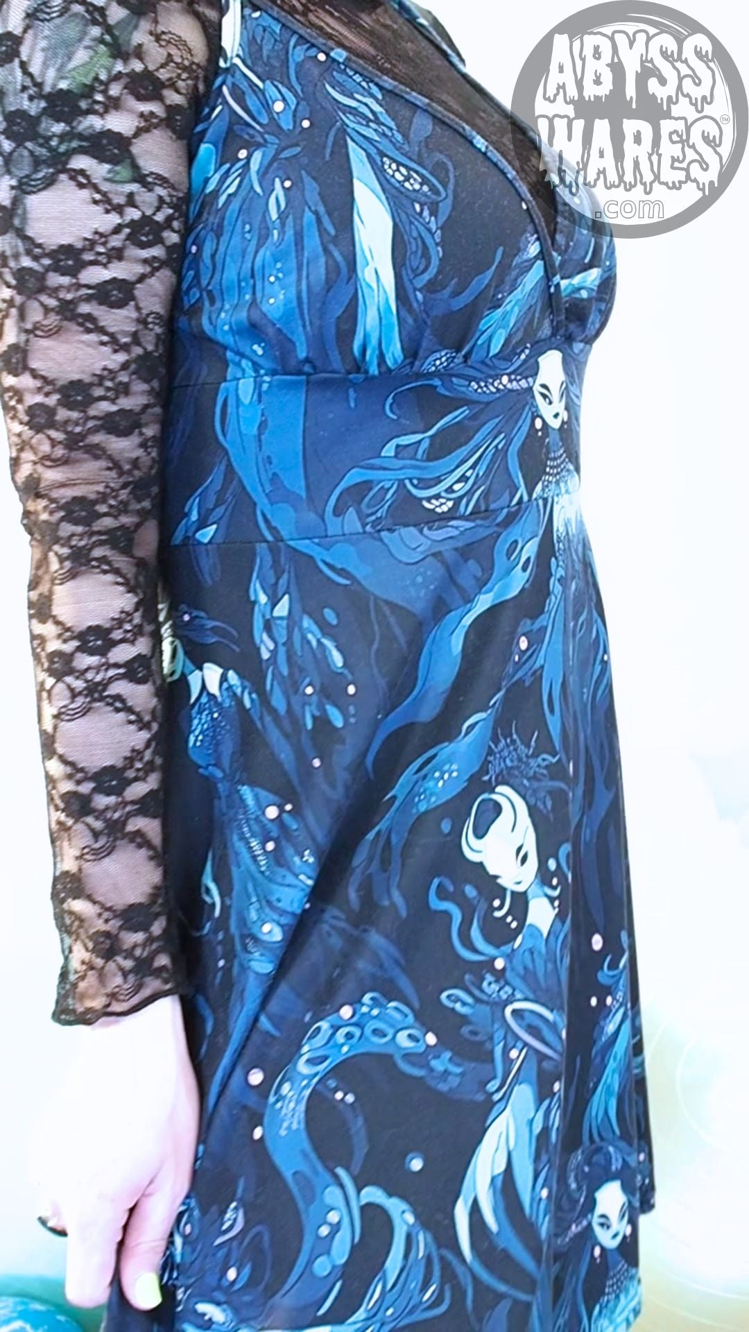 Blue and black patterned dress with 'Abyss Wares' logo in the corner