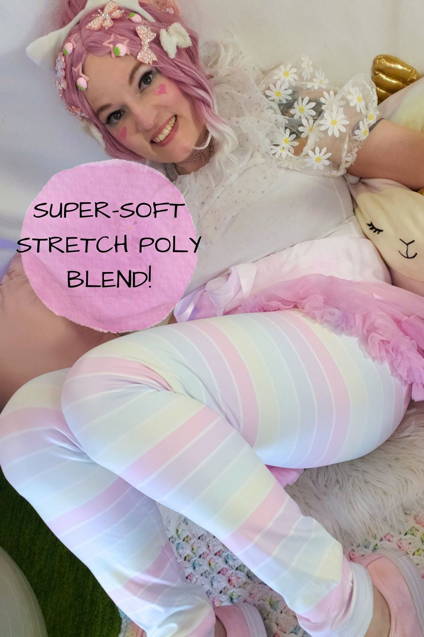 Person wearing pastel striped leggings with text 'Super-Soft Stretch Poly Blend' on a pink background
