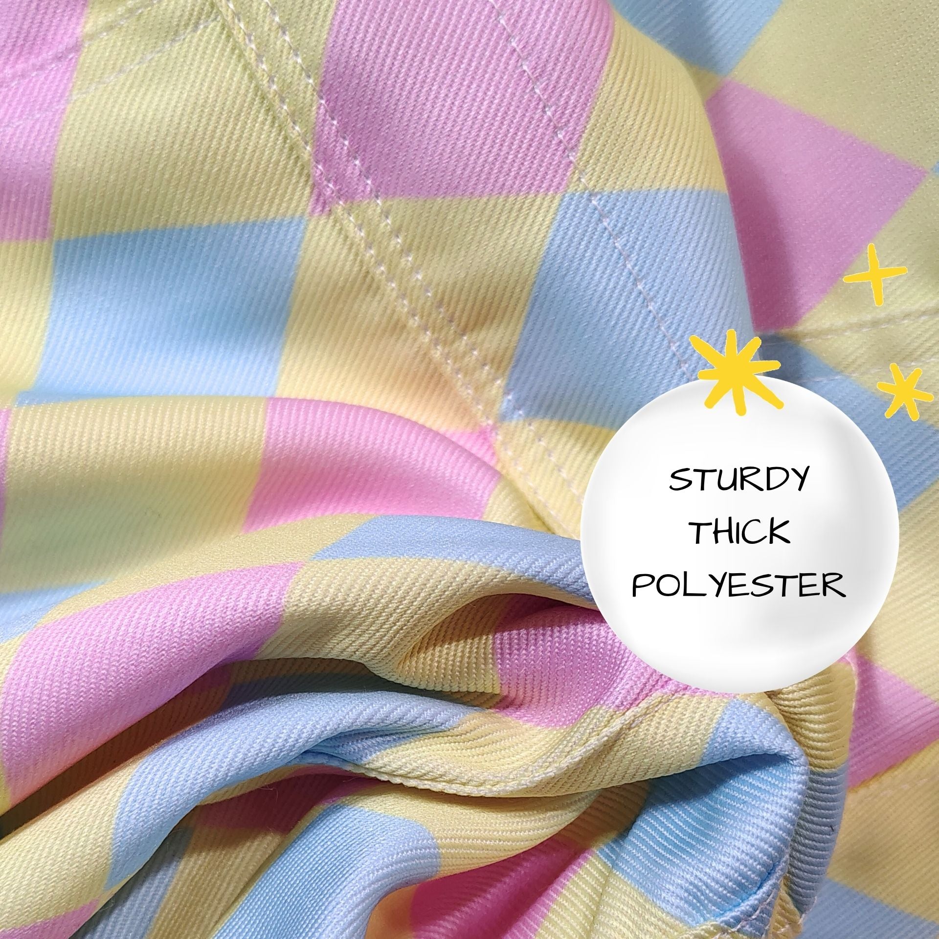 Close-up of colorful checkered fabric with a label indicating 'Sturdy Thick Polyester'.