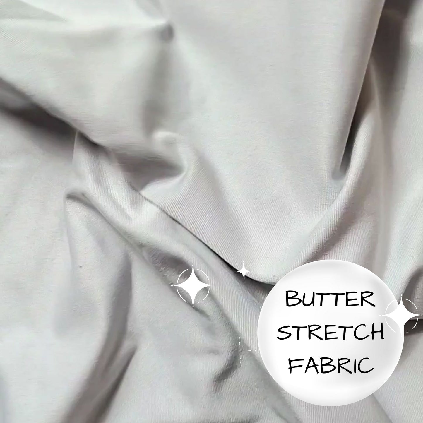 Gray fabric with 'Butter Stretch Fabric' label