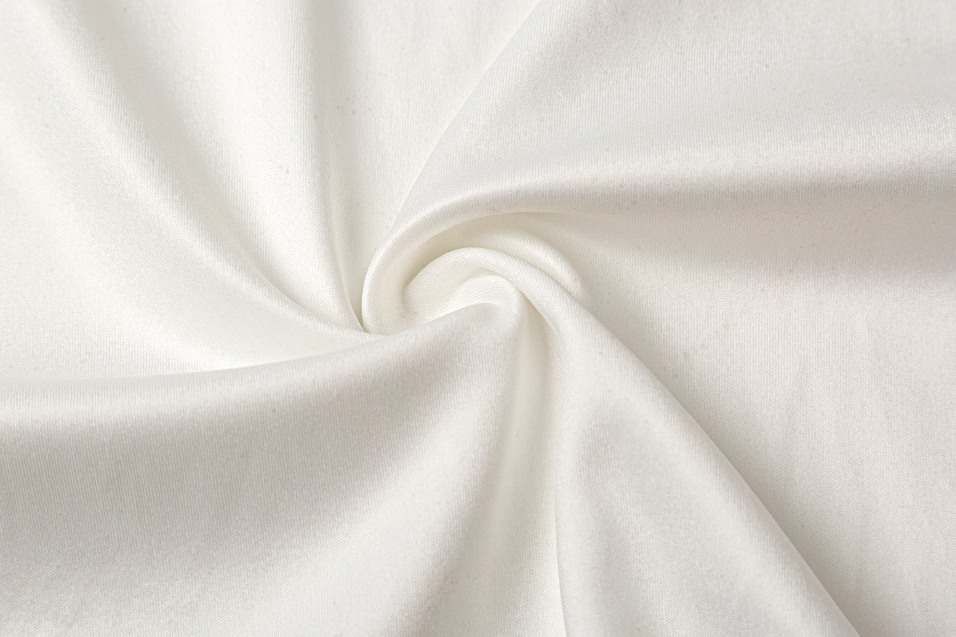 Close-up of white fabric with folds